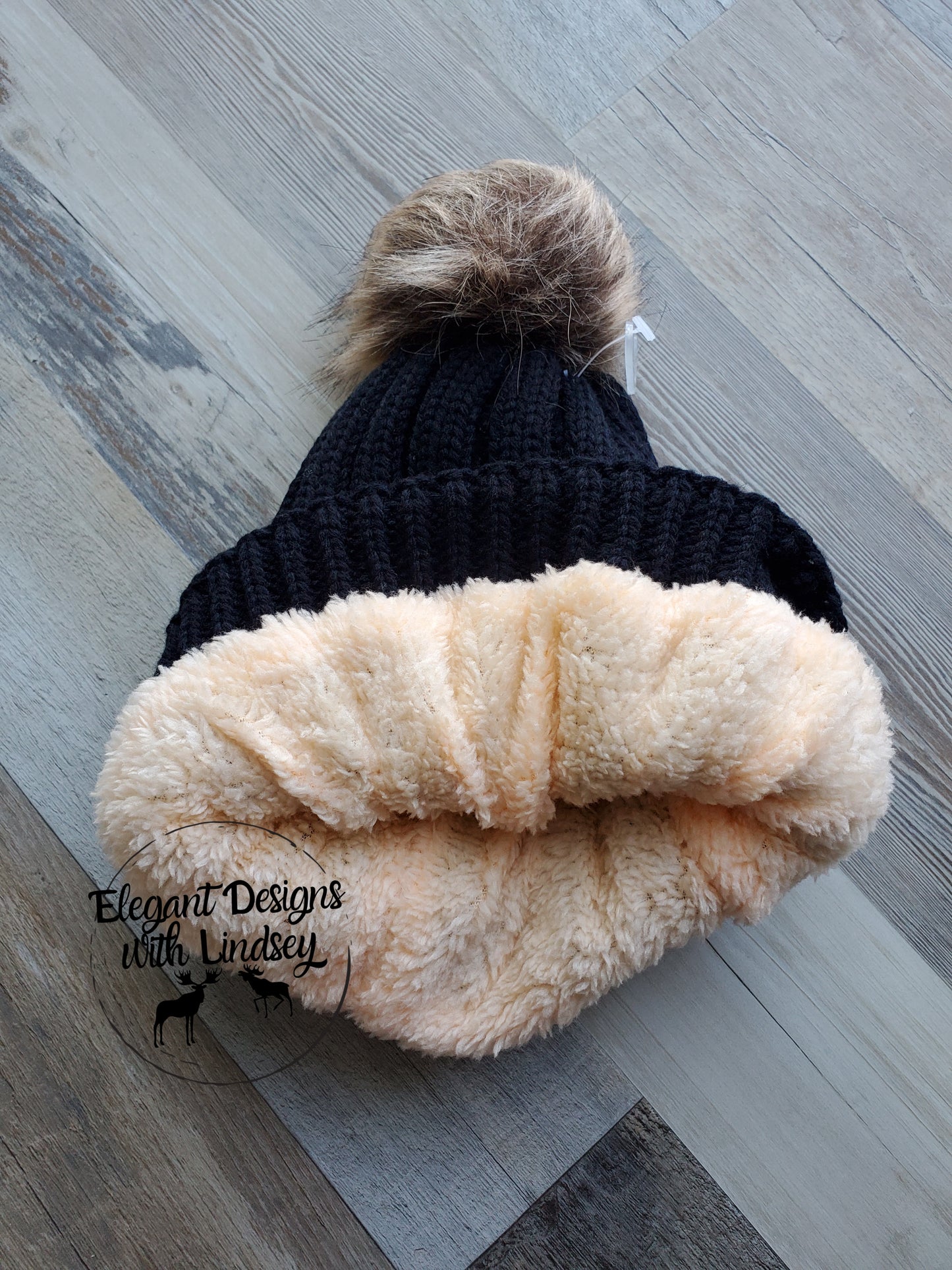 Black winters hat with pom