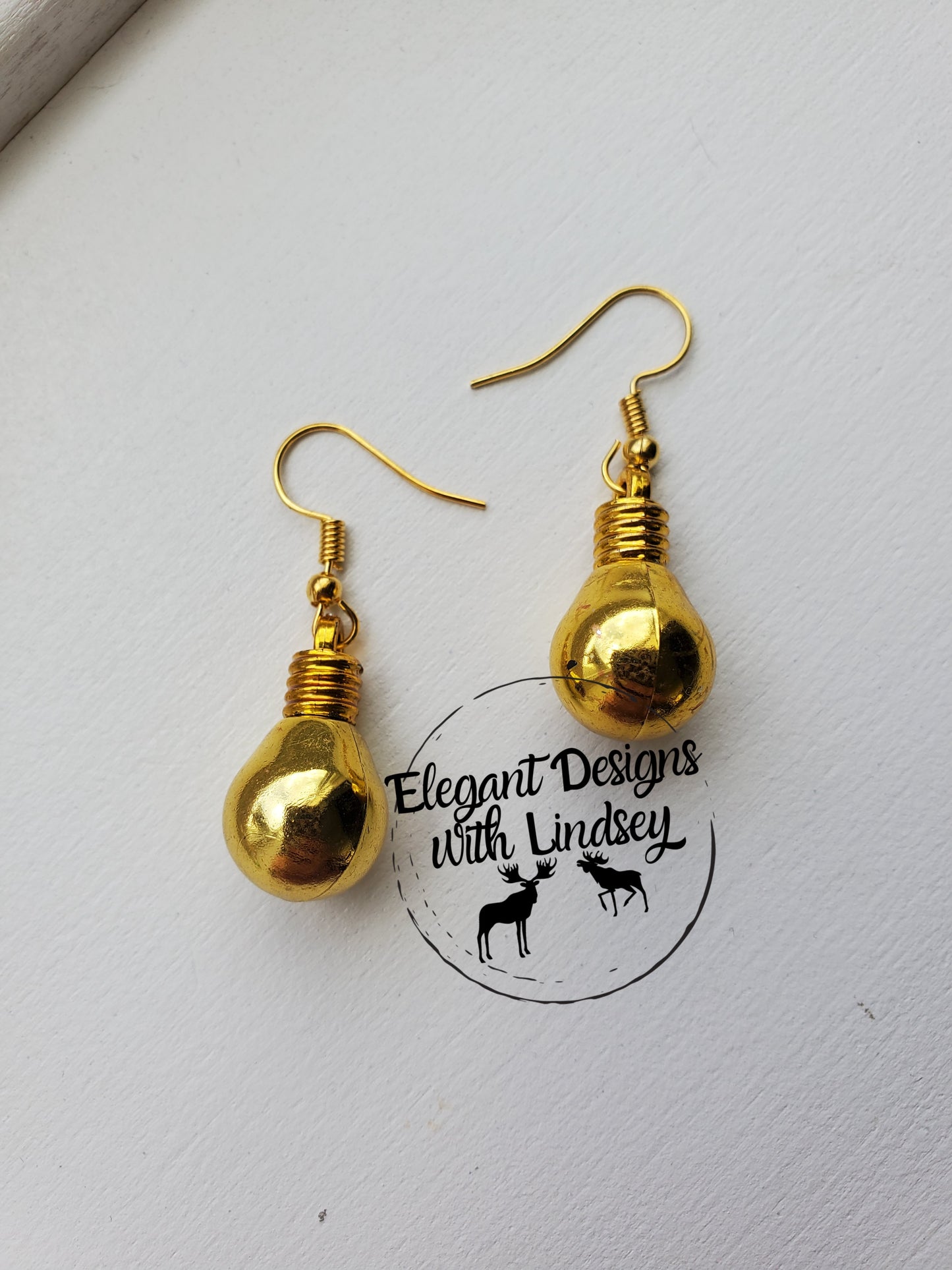 Gold Christmas bulb earrings