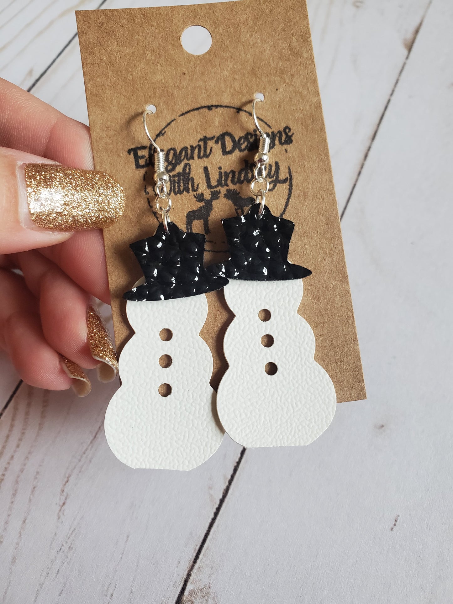 Snowman faux leather earrings