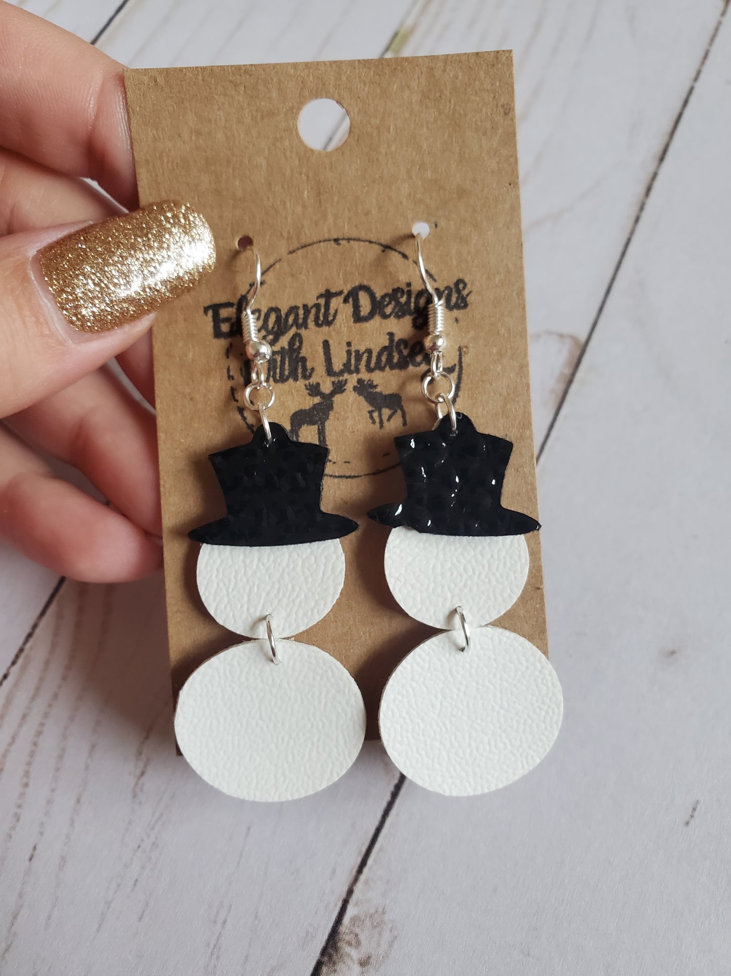 Snowman faux leather earrings