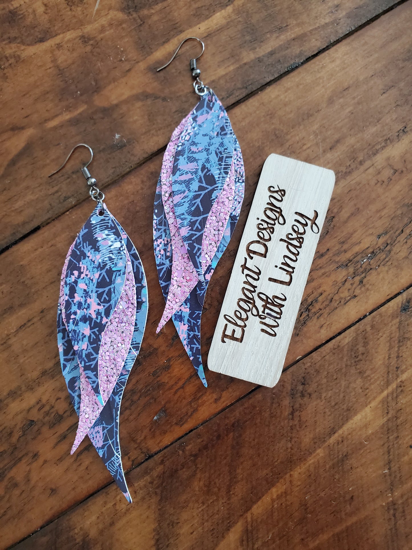 Blue/purple feather faux leather earrings